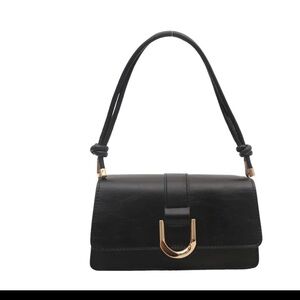 Chic Black Shoulder Bag with Gold Detailing